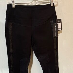 Blanc Noir Black Leggings with Textured Accents and Side Pockets